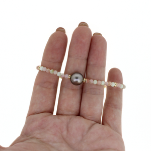 Brianne & Co. pink/green facet opal and Tahitian pearl bracelet on hand for size reference