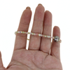 Brianne & Co. gold fill opal and Tahitian pearl bracelet side close up view of colorful opal gemstones