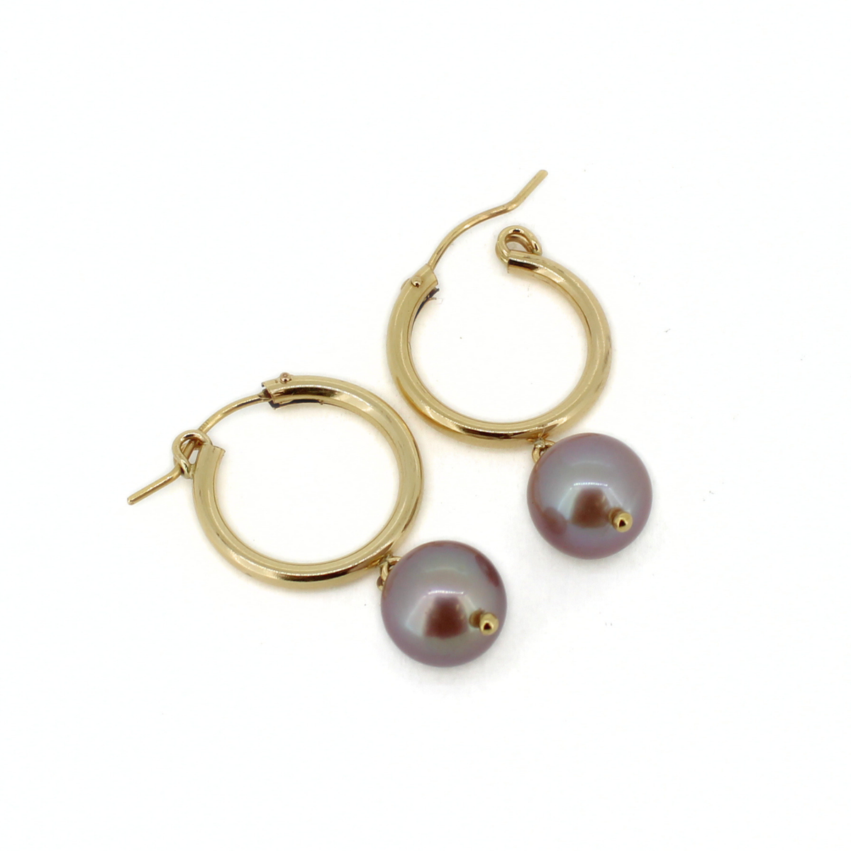 Gold hoop earrings with dangling round iridescent purple freshwater pearls, shown on a plain white background.