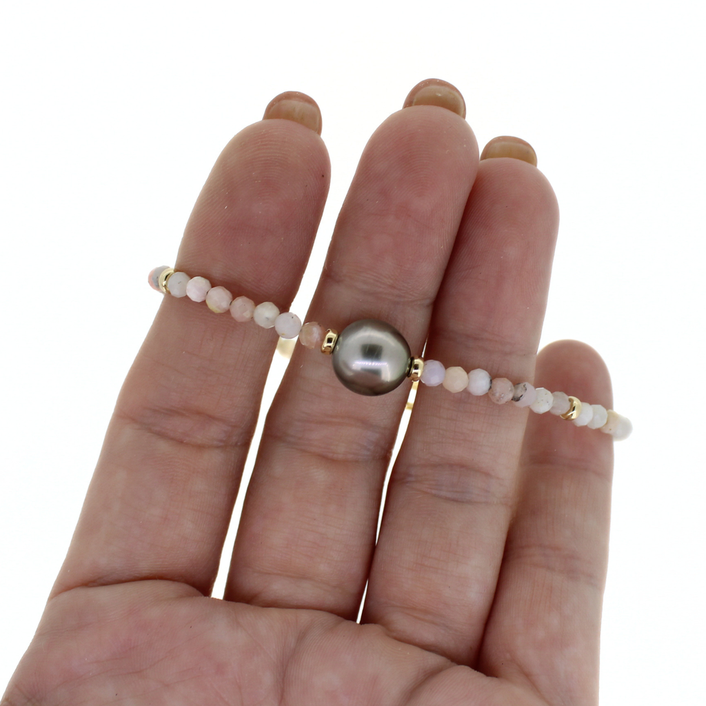 Brianne & Co. gold fill pink opal and Tahitian pearl bracelet on hand for size reference