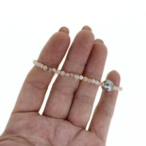 Brianne & Co. gold fill pink opal and Tahitian pearl bracelet side view close up of opal gemstones