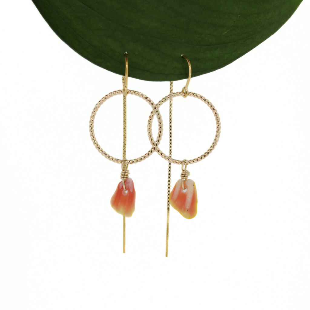 Brianne & Co. gold fill threader style earrings with a twisted hoop and sunrise shell pieces