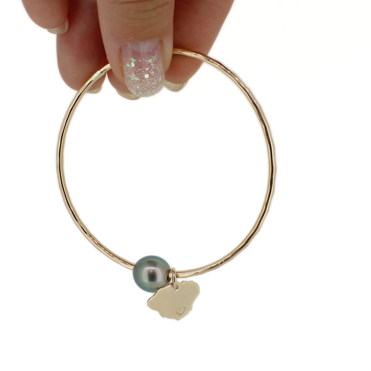 14k gold fill round bangle bracelet with genuine Tahitian pearl and Kauai island charm shown against a white background 