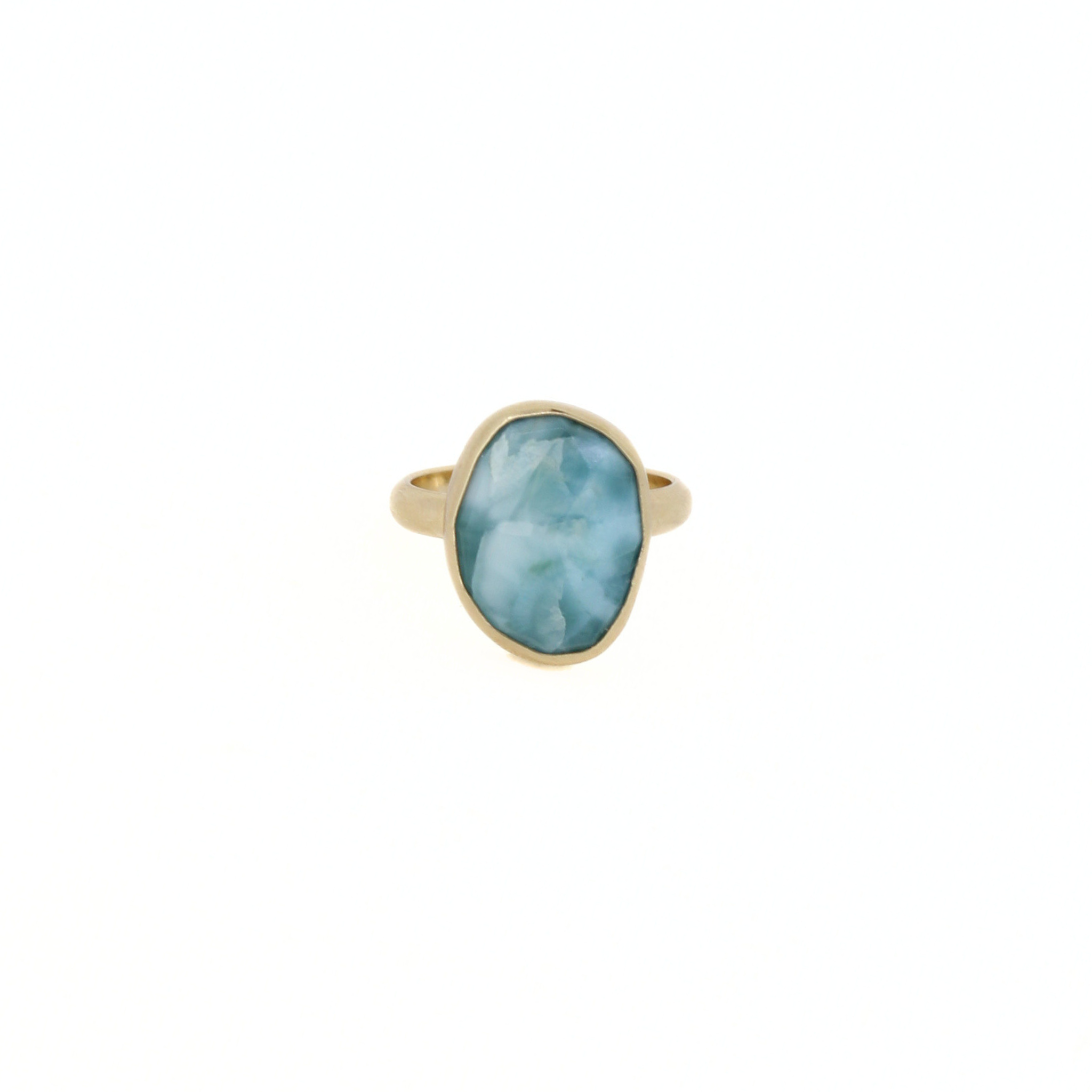 Gold-tone ring with oval blue larimar gemstone and slim band
