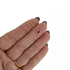 Brianne & Co bezel set lab created ruby in gold