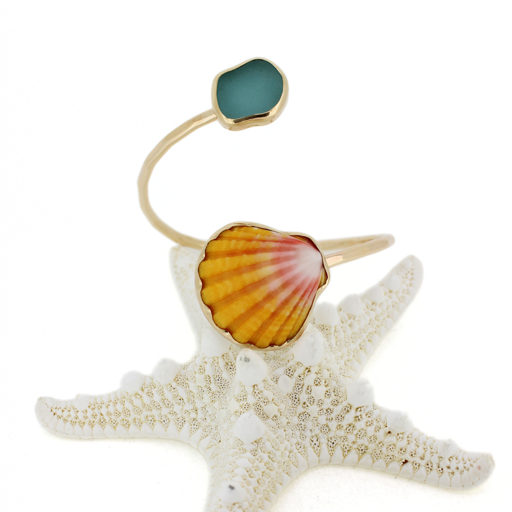 Brianne & Co. gold sunrise shell and sea glass bypass style cuff up close front view