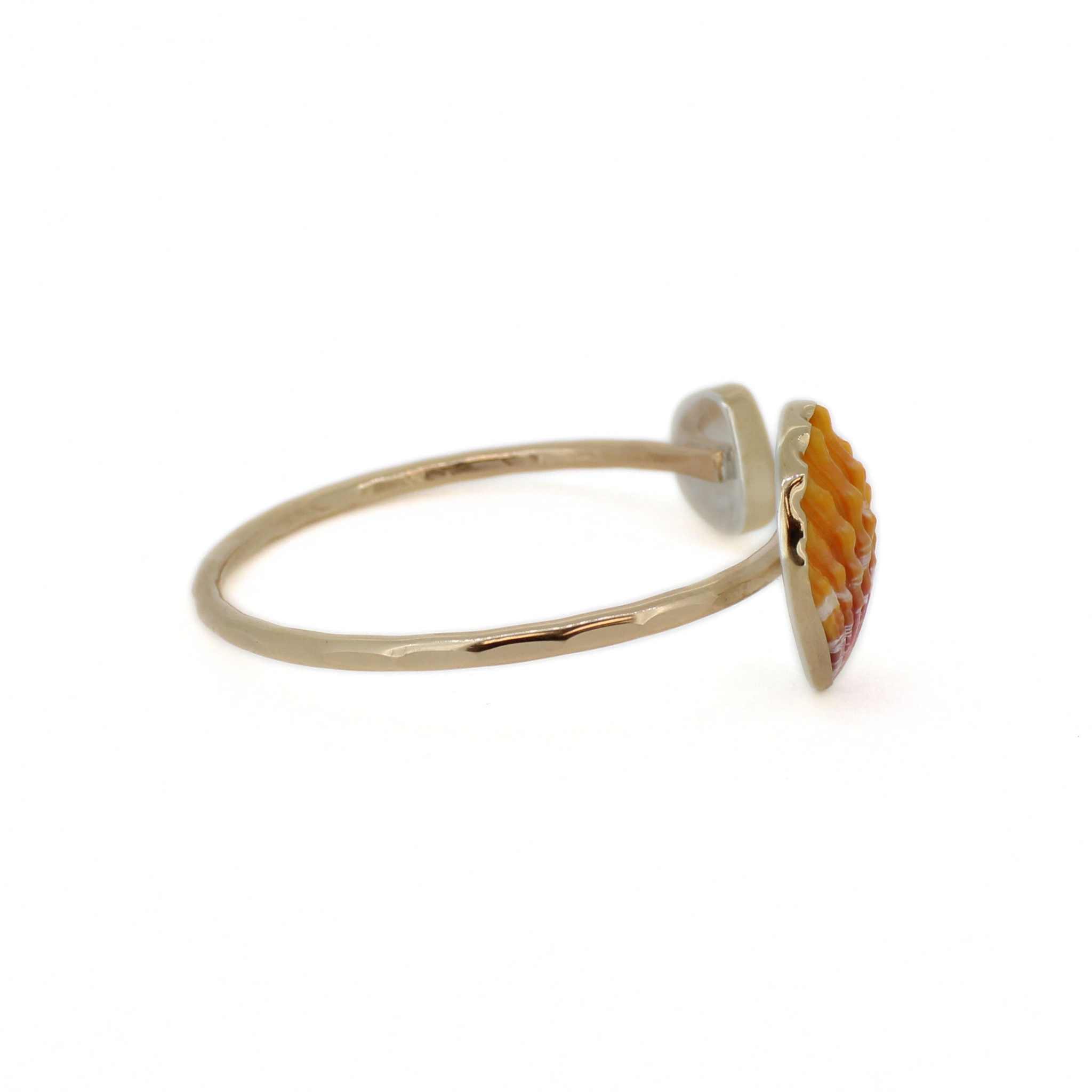 Gold tone cuff bracelet with orange sunrise shell and teal sea-glass square setting
