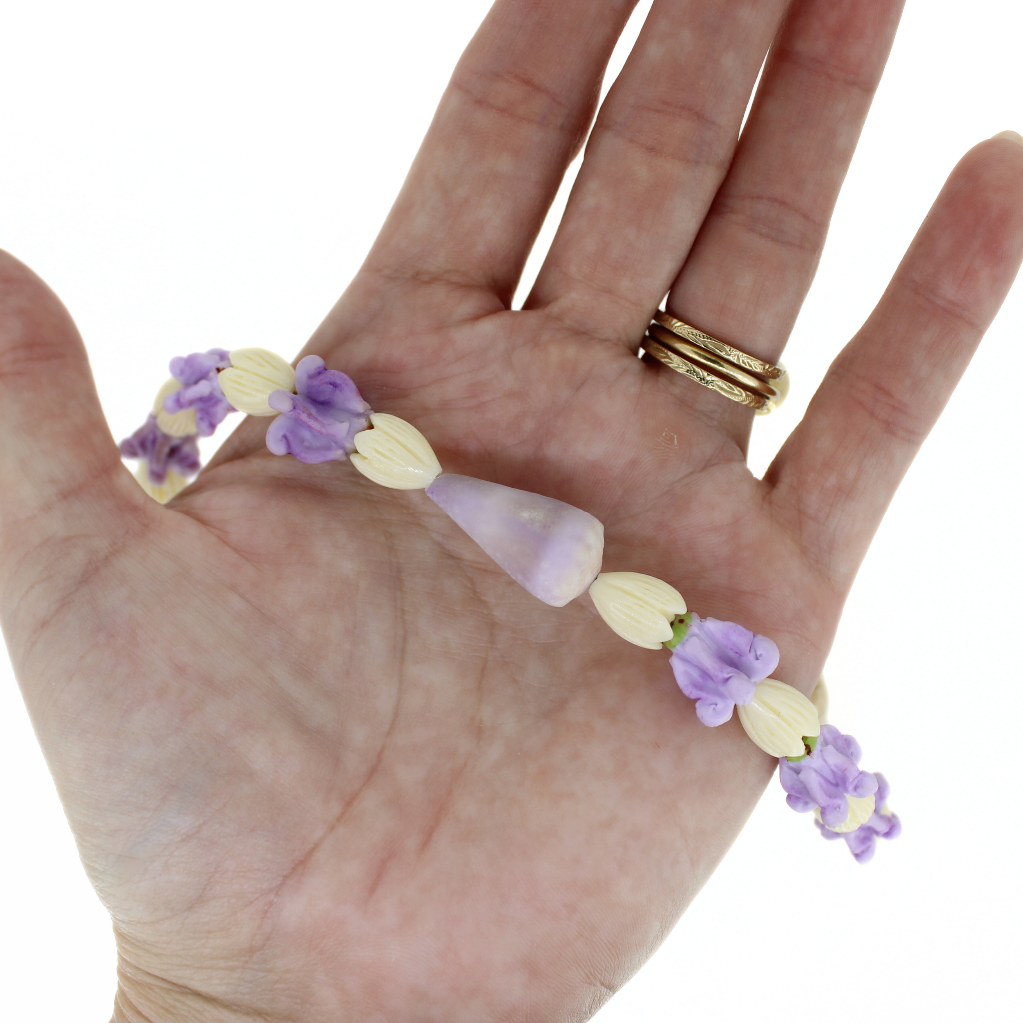 Short Purse Lei- Pikake/Crown Flower with Cone Shell