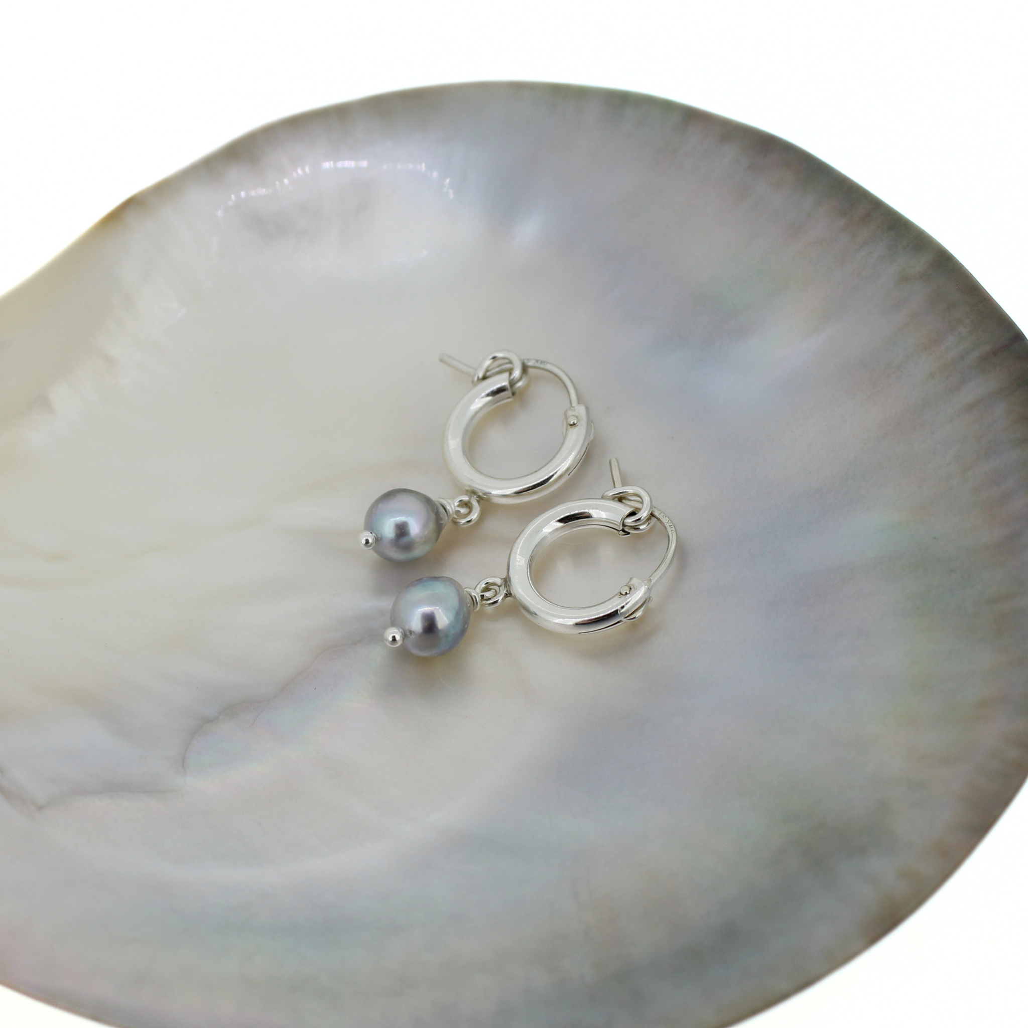 Brianne & co. sterling silver 12mm hoop earrings featuring tiny baby blue akoya pearls handmade in Kauai Hawaii