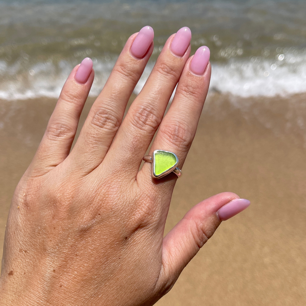 Sterling silver lime green sea glass ring size 8 on hand model 