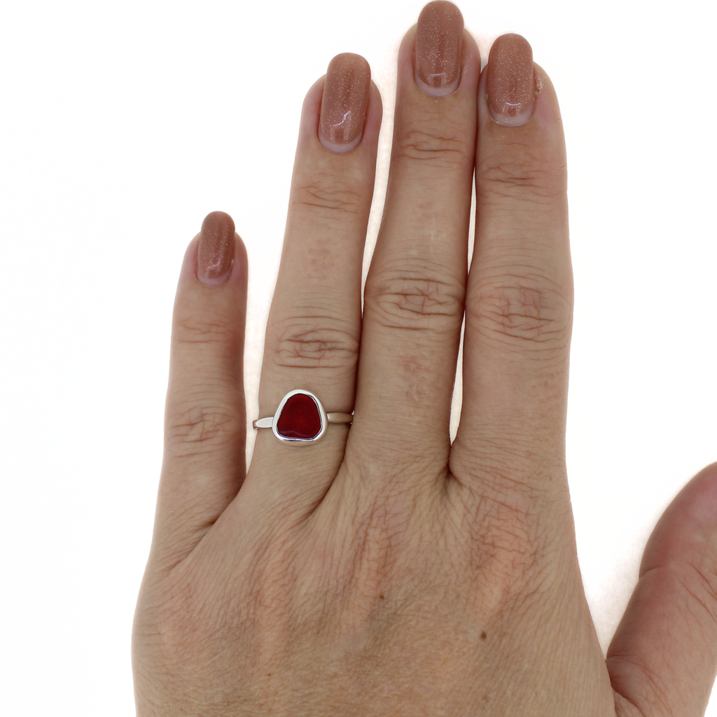 Brianne & Co. sterling silver Red Sea glass ring on hand for size reference 