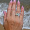 Sterling silver bezel set sea glass ring with wide puakenikeni flower stamped band size 6 handmade by Brianne & Co.