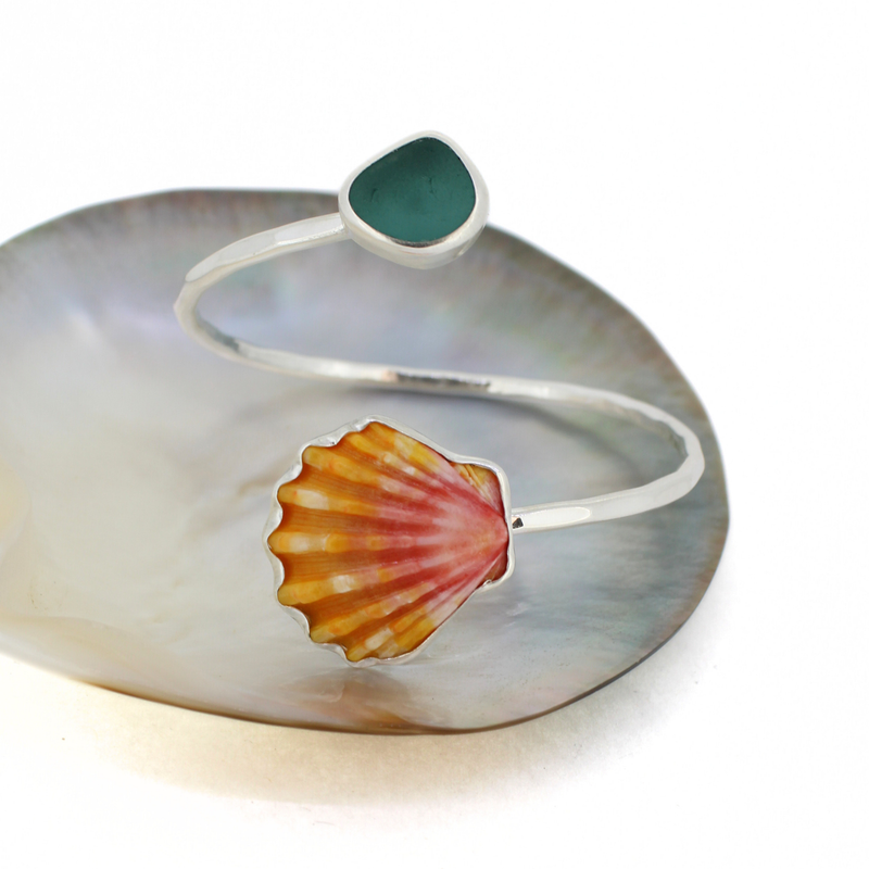 Sterling silver Hawaiian sunrise shell and sea glass bypass style cuff in sterling silver handmade by Brianne & Co.