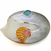 Sterling silver sunrise shell and blue sea glass bypass style cuff handmade by Brianne & Co.