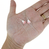 Brianne & Co. sterling silver threader style earrings with pink and white conch shell pikake flowers