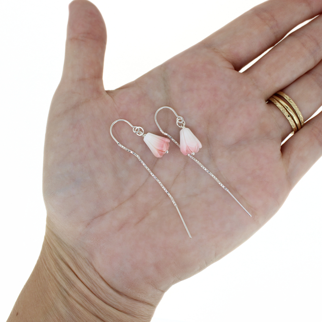 Brianne & Co. sterling silver threader style earrings with pink and white conch shell pikake flowers