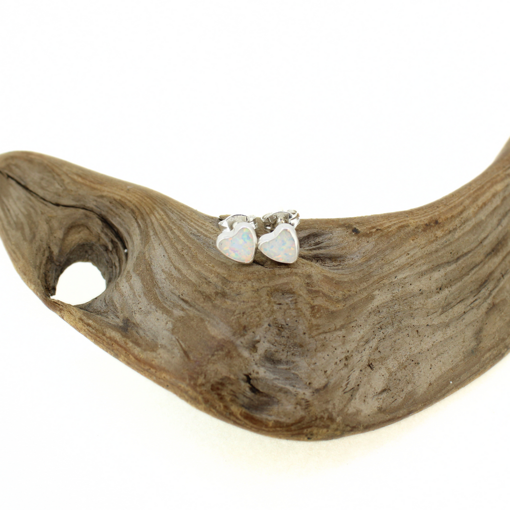 Brianne & Co. sterling silver heart shaped simulated opal stud earrings measuring just over 6mm tall