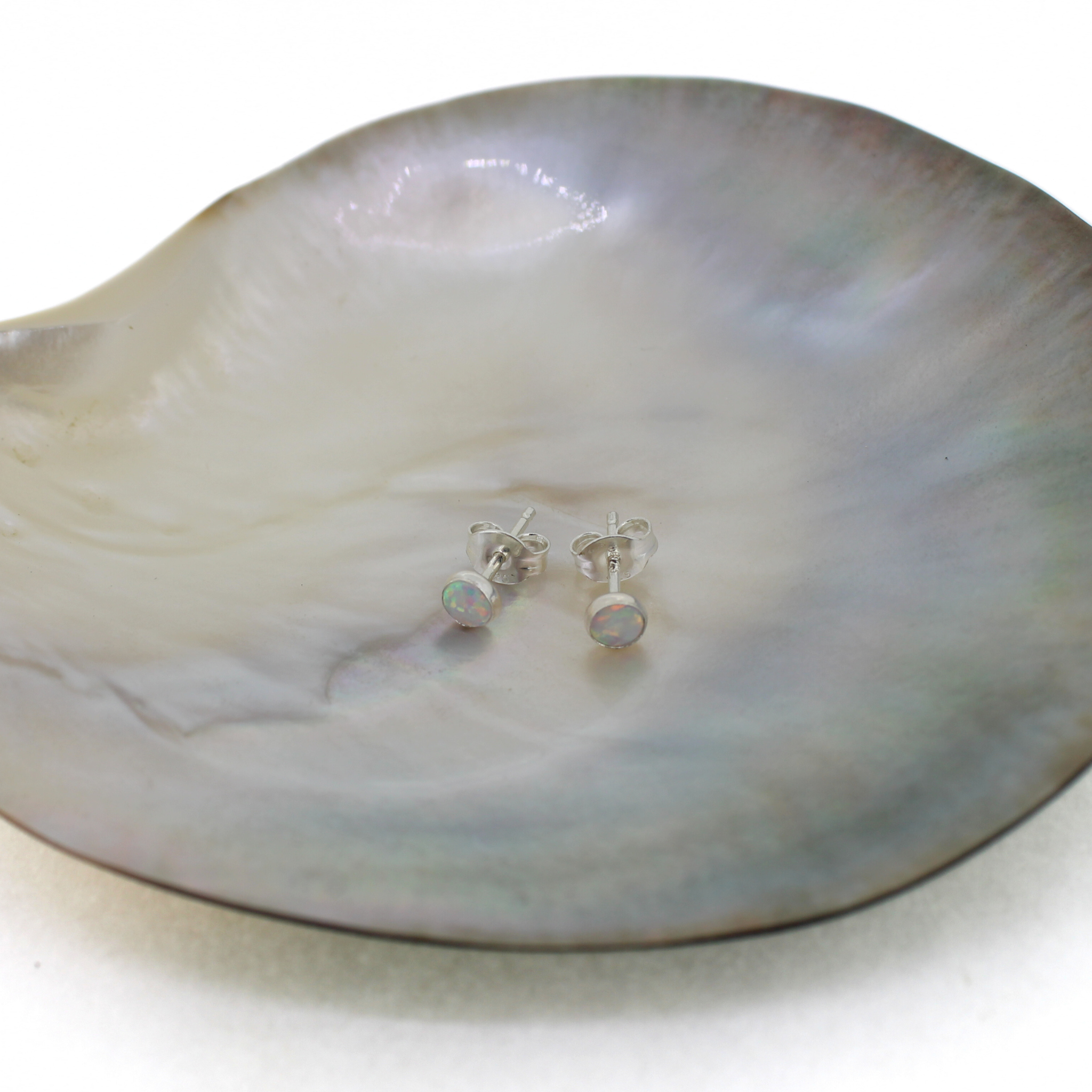 Brianne & Co. telling silver mini simulated opal earrings measuring 4mm large