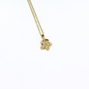 Brianne & Co 14k gold satin finish plumeria pendant on baby rope chain