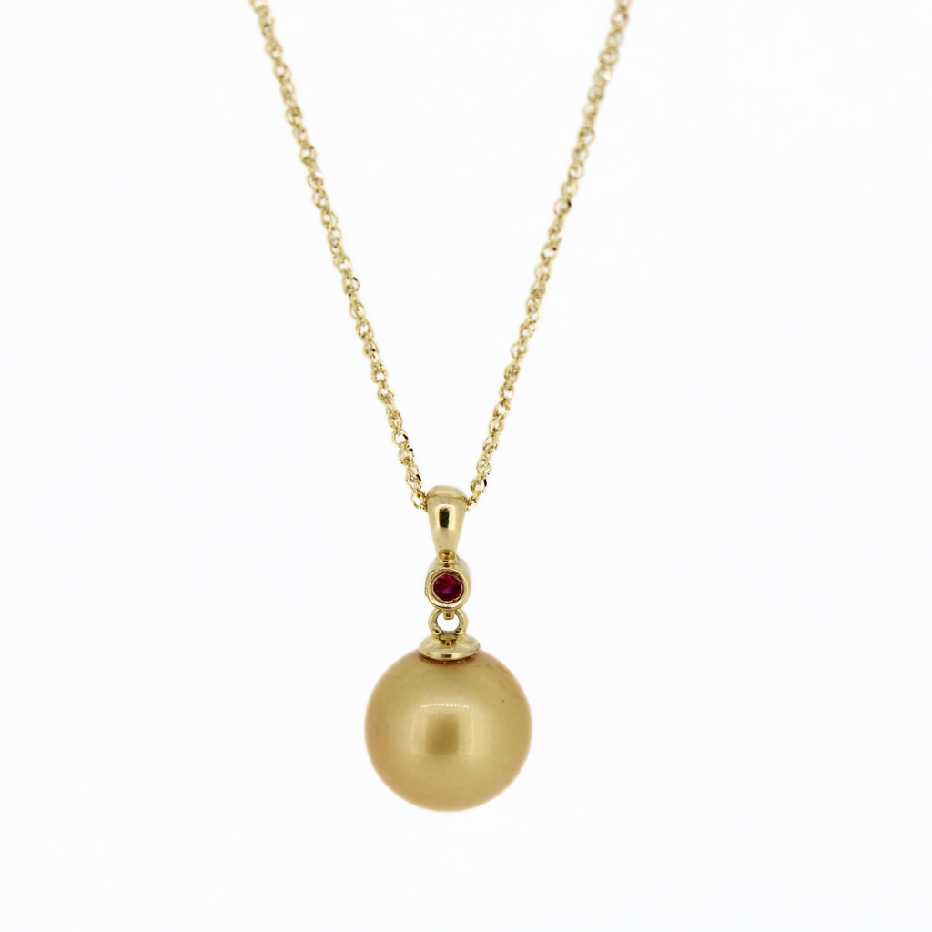 Brianne & Co fine jewelry 14k gold necklace with ruby and golden south sea pearl