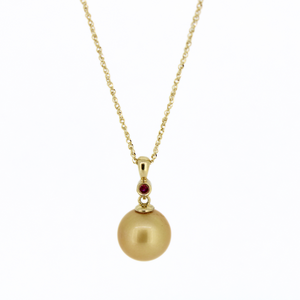 Brianne & Co fine jewelry 14k gold necklace with ruby and golden south sea pearl