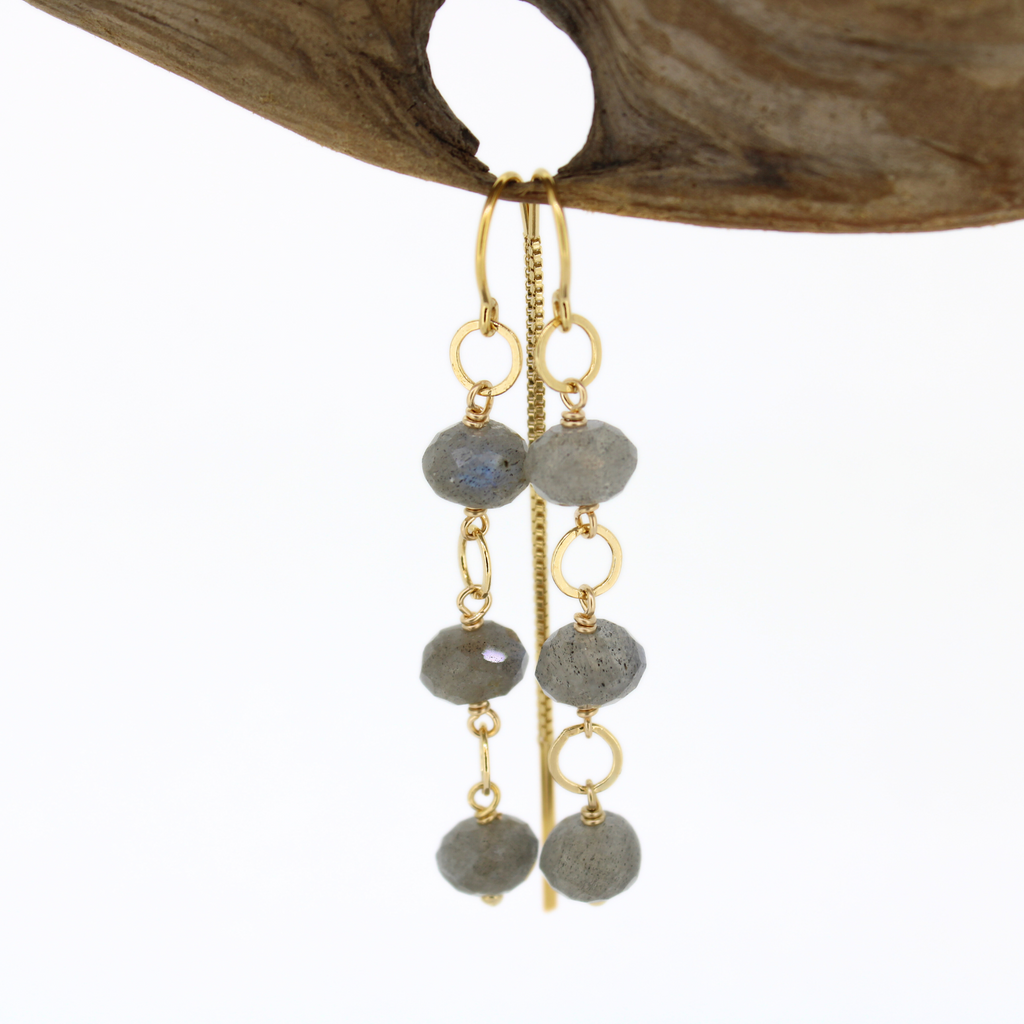 Brianne & Co faceted blue flash labradorite threader earrings shown on driftwood