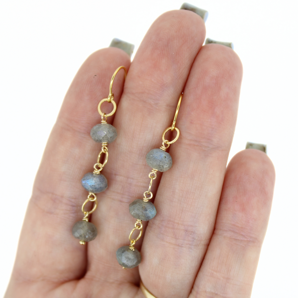 Brianne & Co natural faceted labradorite gold fill threader earrings shown in hand