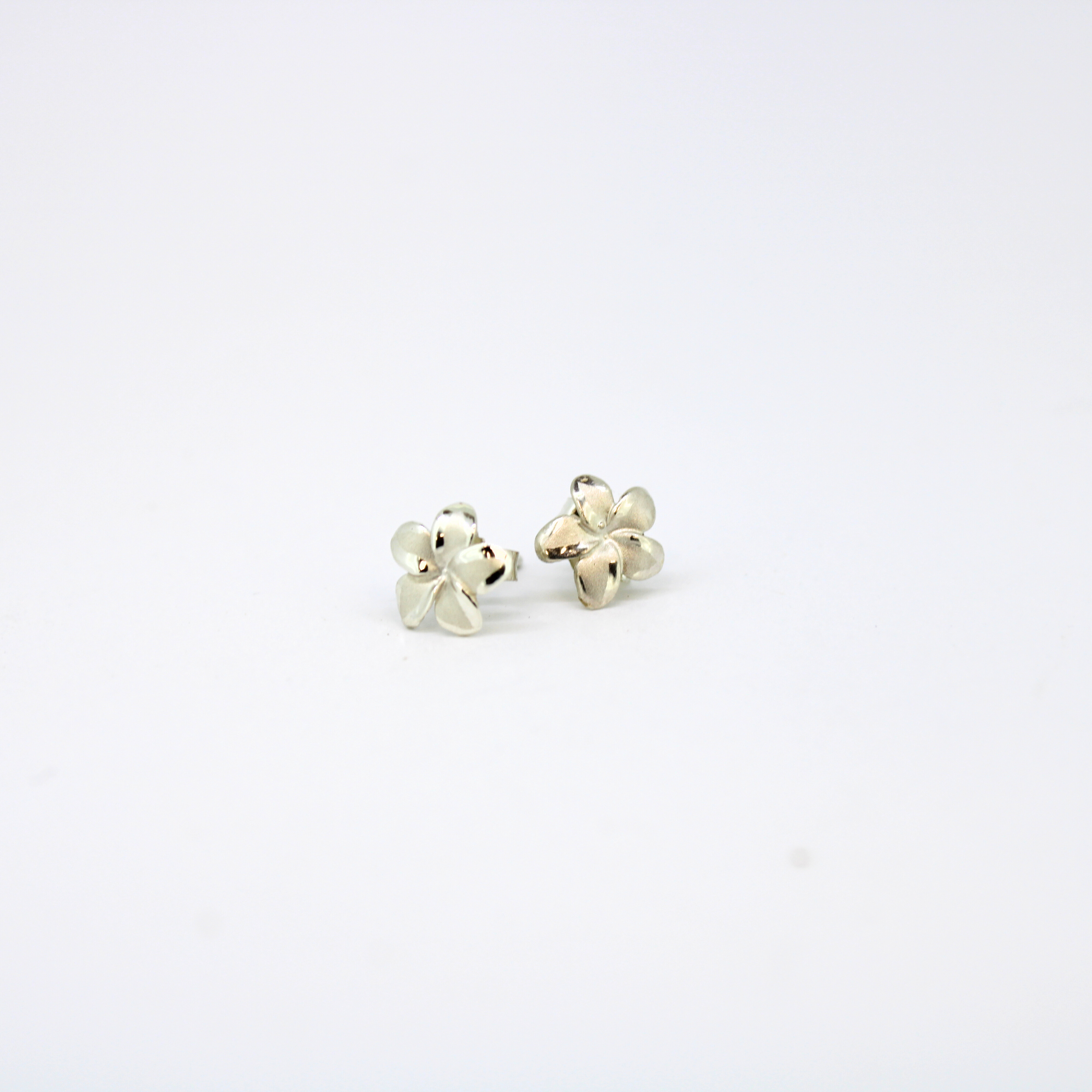 Sterling silver plumeria flower pua melia stud earrings Brianne & Co.