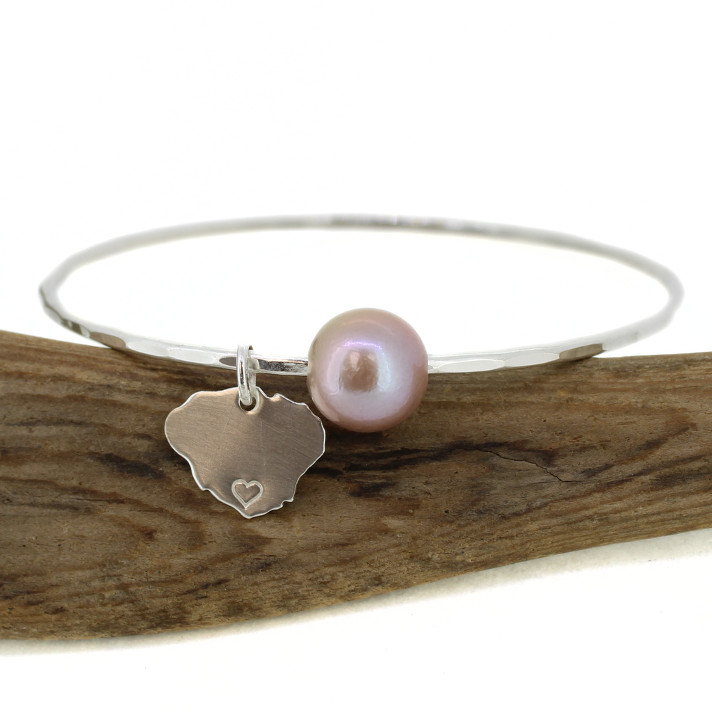 Brianne & Co. sterling silver pink fresh water Edison pearl bangle with Kauai charm front view