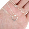 Brianne & Co hand forged and hammered circle pendant on double chain design