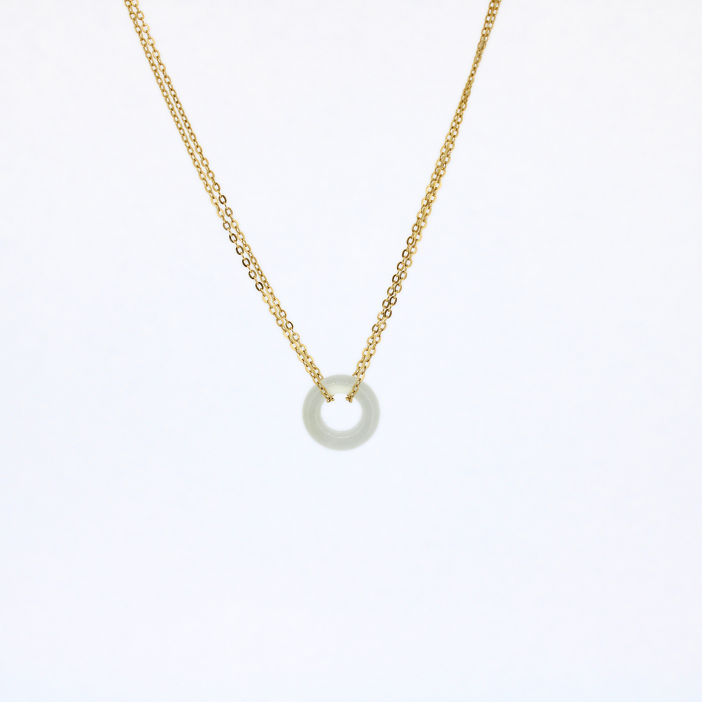 Brianne and Co gold fill necklace with light green mini jade donut