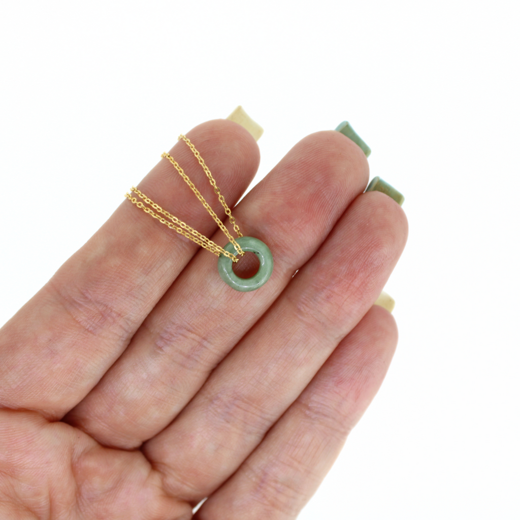 Brianne and Company close up of jade donut on gold filled chain