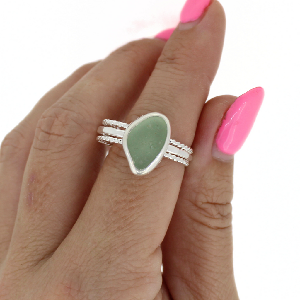 Sterling Silver Light Green Sea Glass Ring with Textured Bands Size 10 on a finger