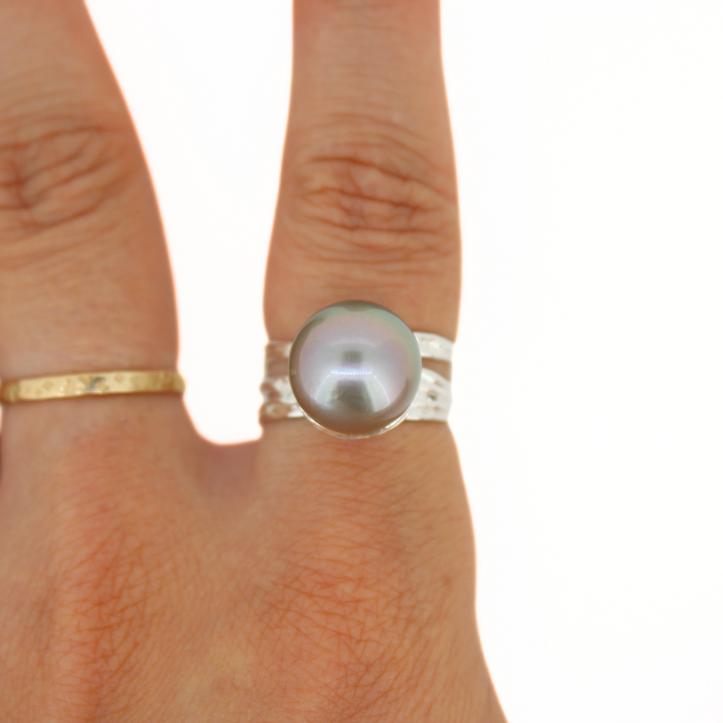 Brianne & Co. sterling silver ring with beautiful peacock Tahitian pearl on hand
