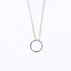 Brianne & Co necklace with string silver hammered circle