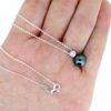 Brianne & Company Tahitian pearl on sterling silver rolo chain with simple clasp, shown in hand
