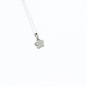 Brianne & Co sterling silver satin finish plumeria pendant with cz in center