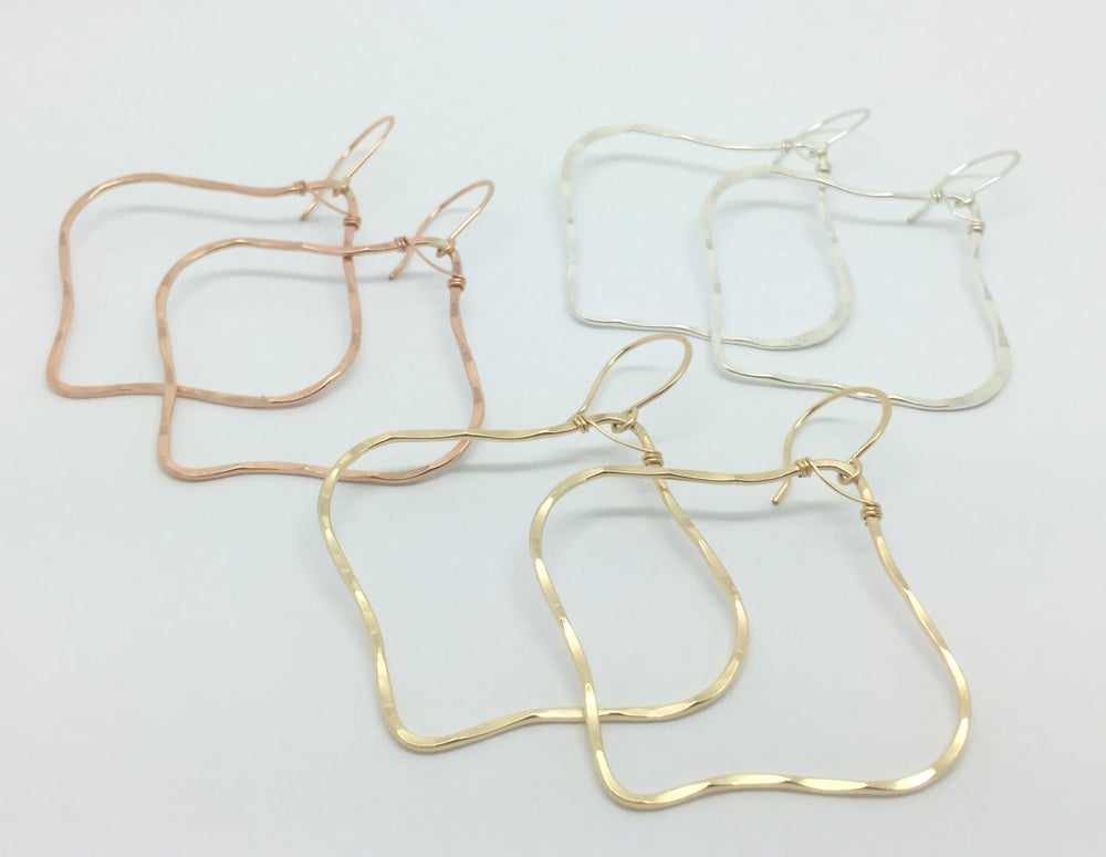 brianne and co lightweight hammered moroccan hoop earrings shown in gold, rose gold, and silver