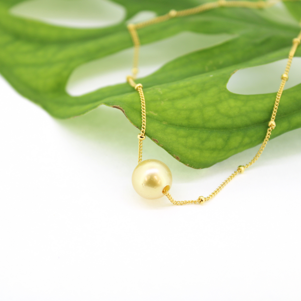 Brianne & Co golden south sea pearl floating on gold fill satellite chain
