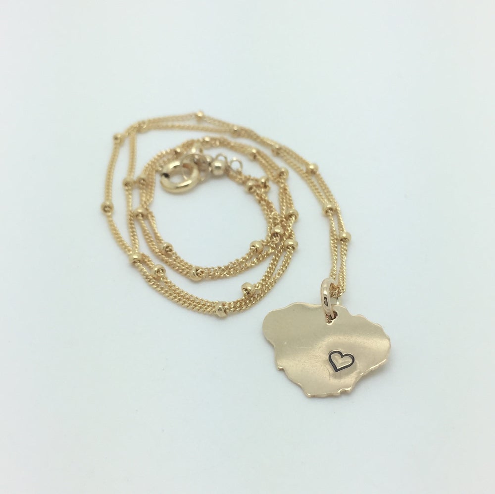 Kauai Island pendant on satellite chain with heart stamp available in shown gold filled
