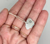 Kauai Island pendant on satellite chain with heart stamp shown in sterling silver. 