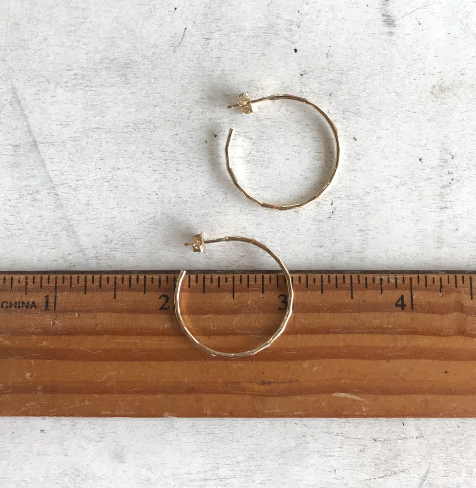gold filled hammered hoops showing measurement, with 1 inch diameter