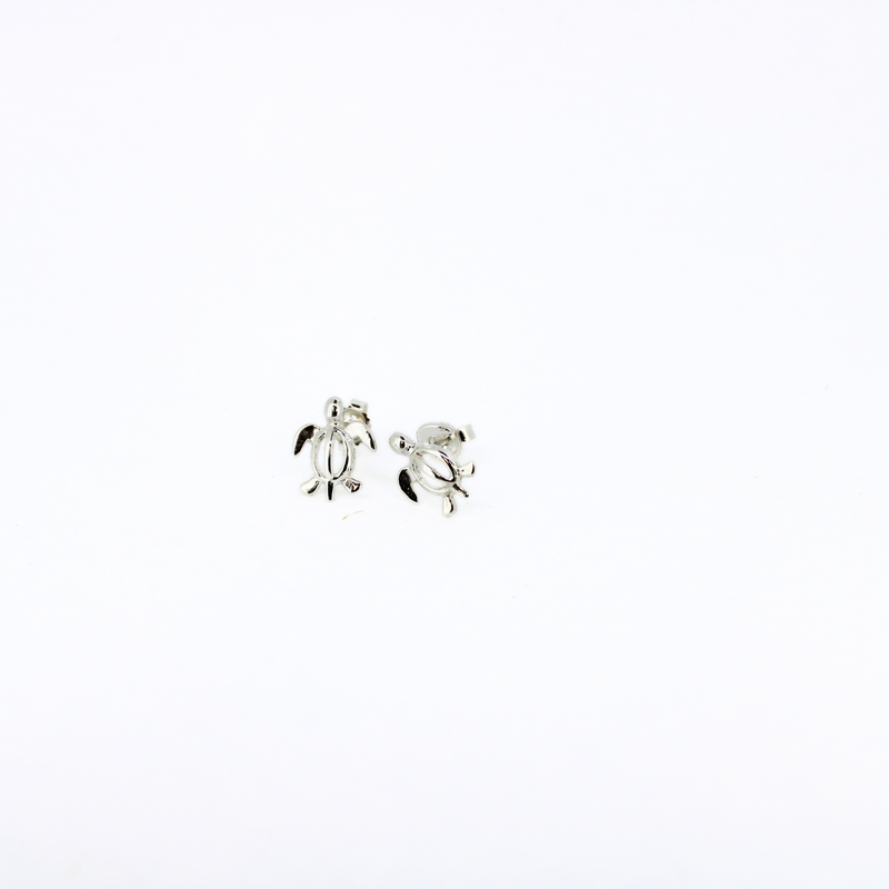 Brianne & Co sterling silver sea turtle stud earrings shown in hand