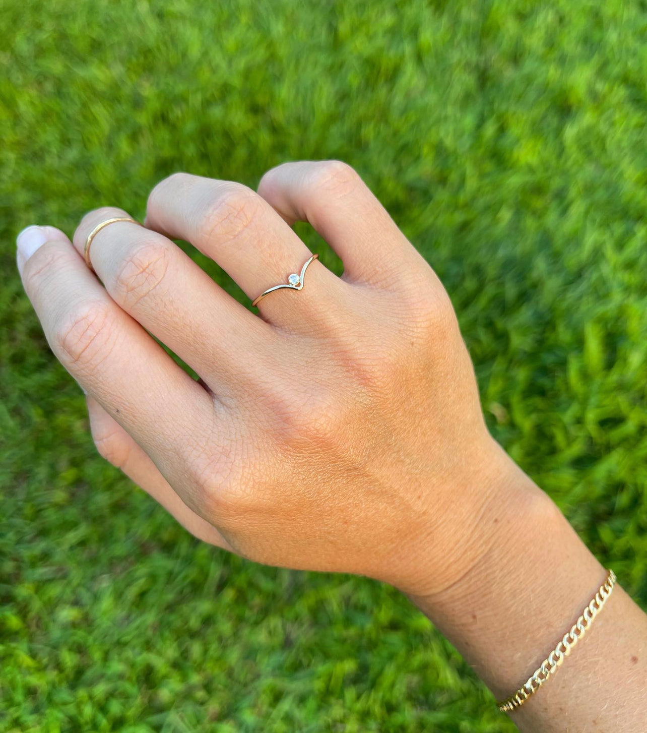 Brianne & Co. gold fill CZ chevron ring on hand model